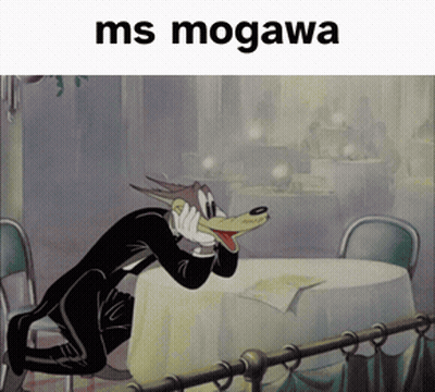 Wolf In Tuxedo Sitting At Table Ms Mogawa Above Him GIF