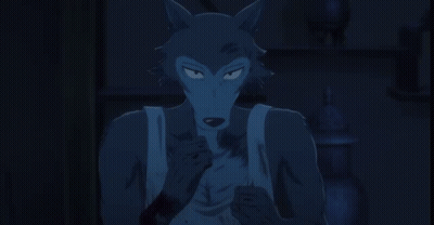 Wolf With Red Eyes Looking At Camera GIF