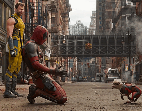 Wolverine And Deadpool Are Kneeling Down On The Street GIF