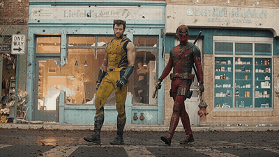 Wolverine And Deadpool In Front Of Lieffeld's Just Feet GIF