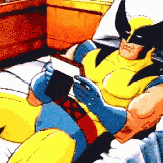 Wolverine Reading A Book GIF