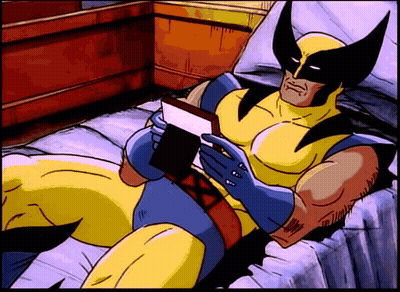 Wolverine Reading Book On Bed GIF