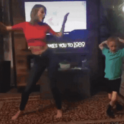 Woman And Boy Dancing In Front Of TV Ty Takes You To 1989 GIF