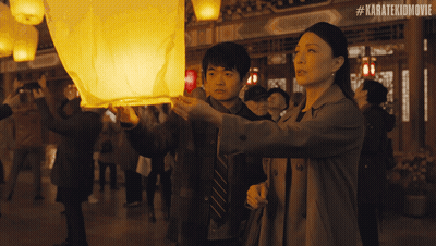 Woman And Boy Looking At Lantern #Karatekidmovie GIF