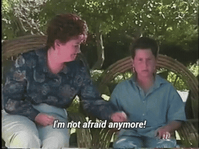 Woman And Boy On Bench Saying I'm Not Afraid Anymore GIF