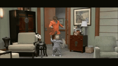 Woman And Child Dancing In Living Room GIF