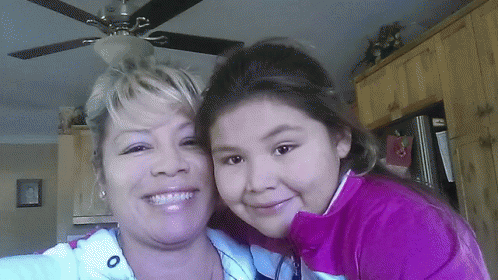 Woman And Girl Posing Pink Jacket GIF