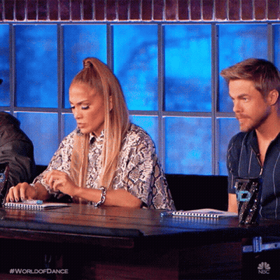 Woman And Man At Table Saying World Of Dance GIF