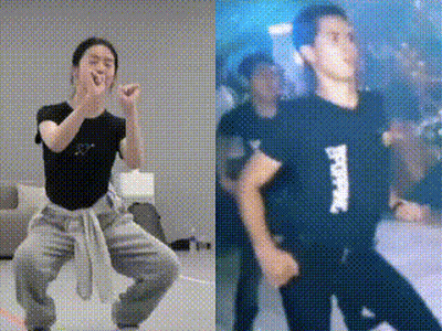Woman And Man Dancing In Front Of Crowd GIF