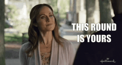 Woman And Man Hallmark Movie Saying This Round Is Yours GIF