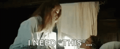 Woman And Man In Bed Saying I Need This GIF