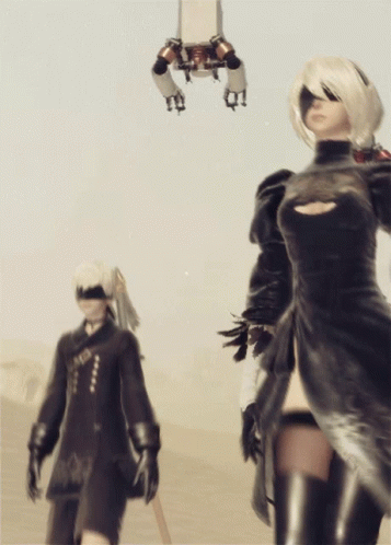 Woman And Man In Black Dresses GIF