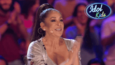 Woman Applauding In Front Of Idol Kids Sign GIF