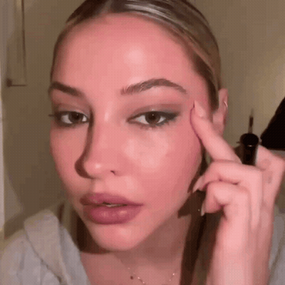 Woman Applying Eyeliner To Eyebrows GIF