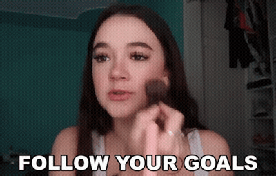 Woman Applying Makeup Follow Your Goals GIF