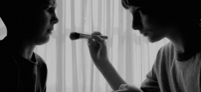 Woman Applying Makeup To Another GIF