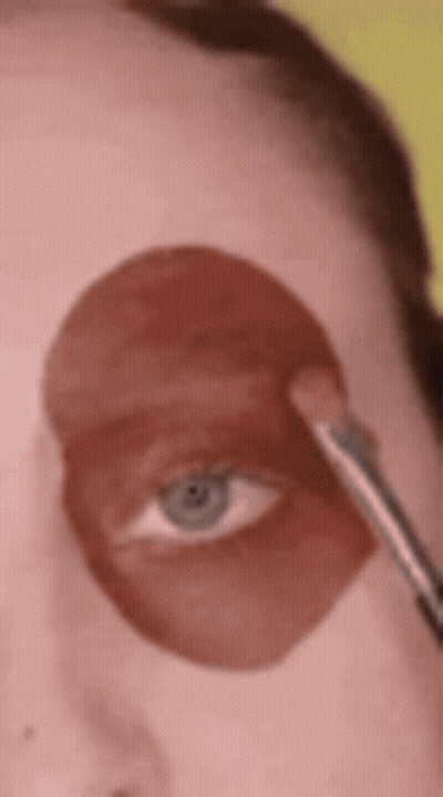 Woman Applying Makeup To Eye GIF