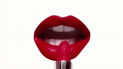 Woman Applying Red Lipstick With Tongue