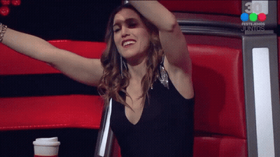 Woman Arms Outstretched In Front Of 30 Festejemos Juntos Sign GIF