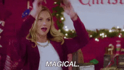 Woman Arms Up Saying Magical Christmas Tree GIF