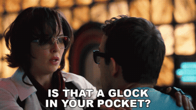 Woman Asking Man If There Is Glock In His Pocket GIF