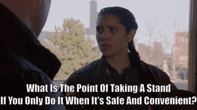 Woman Asking Man What's The Point Of Taking A Stand GIF