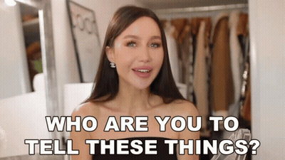 Woman Asking Who Are You With Chanel Earrings GIF