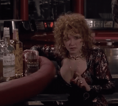 Woman At Bar With Usher's Whisky GIF