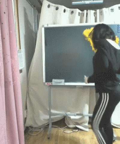 Woman At Blackboard Saying E GIF
