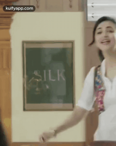 Woman At Chalkboard Saying Silk GIF