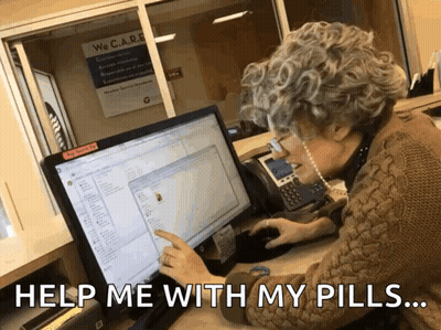 Woman At Computer Saying Help Me With My Pills GIF