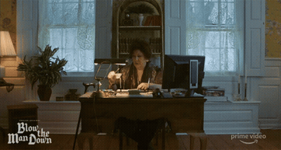Woman At Computer With Blow The Man Down GIF