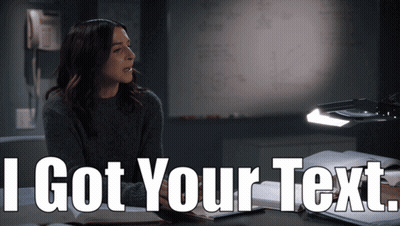 Woman At Desk I Got Your Text GIF