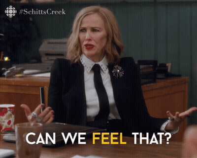 Woman At Desk Saying Can We Feel That GIF
