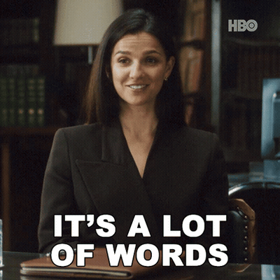 Woman At Desk Saying It's A Lot Of Words GIF