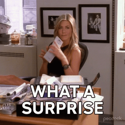 Woman At Desk What A Surprise GIF