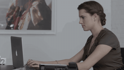 Woman At Desk With Apple Laptop GIF