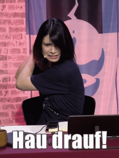 Woman At Desk With Hau-Drauf Sign GIF