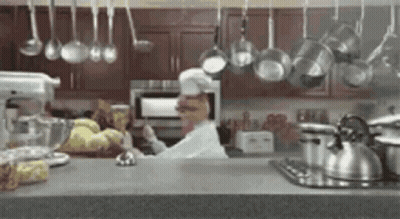Woman At Desk With Keyboard Looking At Camera GIF