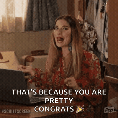 Woman At Desk With Laptop Says That's Because You Are Pretty Congrats GIF