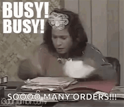 Woman At Desk With Stack Of Papers GIF