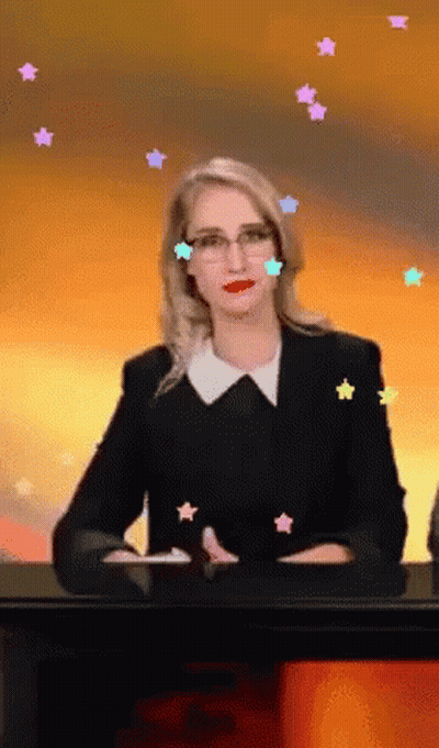 Woman at Desk With Stars Around Head