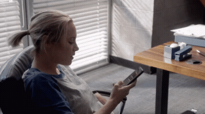 Woman At Desk With Tape Dispenser GIF