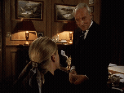 Woman At Desk You Might Think That I Couldn't Possibly Comment GIF