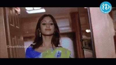 Woman At Door With Dreammedia.com Logo GIF
