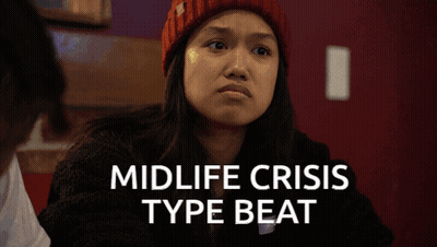 Woman At Microphone In Front Of Creepshow Poster GIF