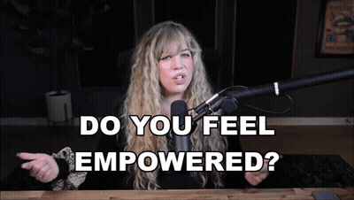 Woman At Microphone Saying Do You Feel Empowered GIF