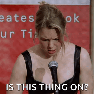 Woman At Microphone Saying Is This Thing On GIF