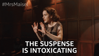 Woman At Microphone The Suspense Is Intoxicating GIF