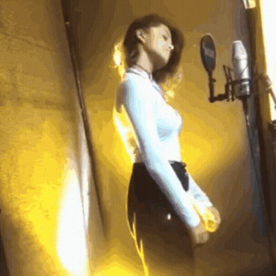 Woman At Microphone With Yamaha Logo GIF